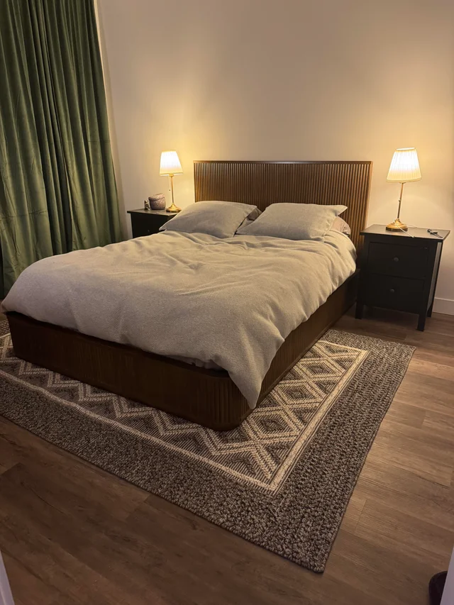 Add a large rug to make the room feel settled