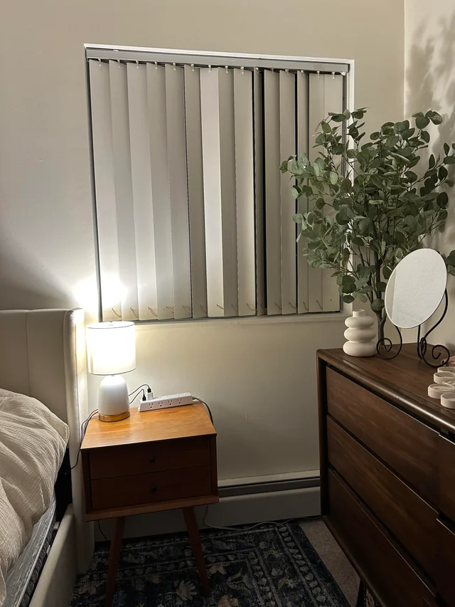 Use curtains to soften plain windows