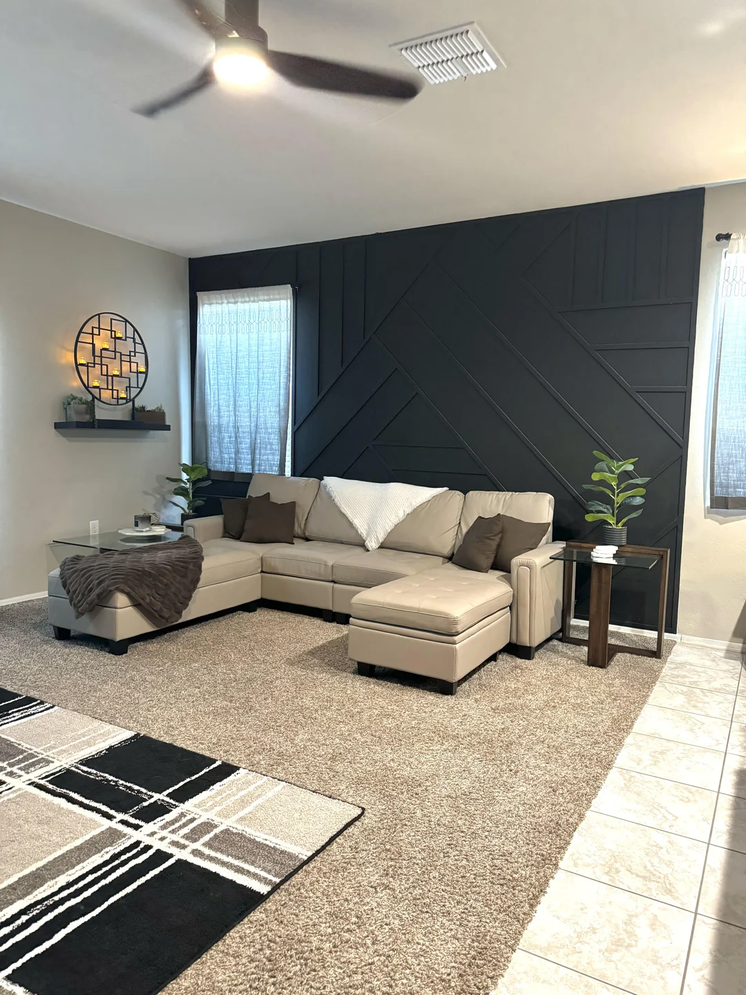 black accent wall living room real home
