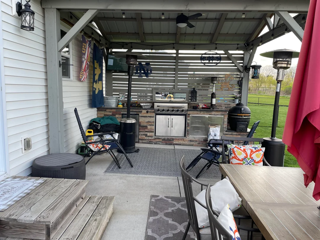 spacious outdoor kitchen layout grill area
