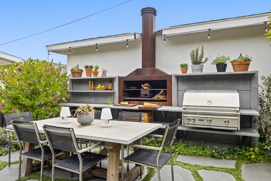 bbq patio dining area next to grill
