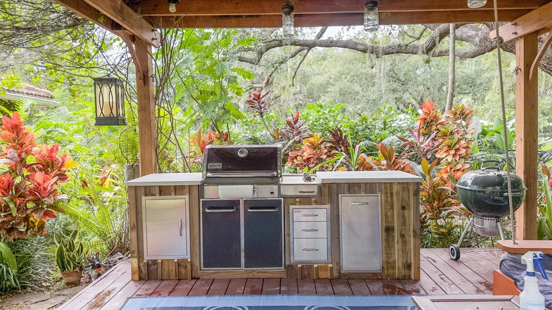 bbq patio with plants and herbs setup
