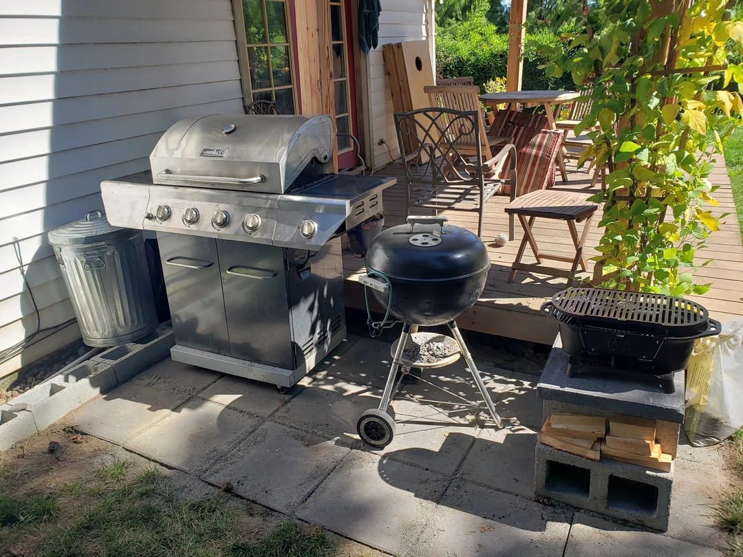 corner outdoor grill setup backyard
