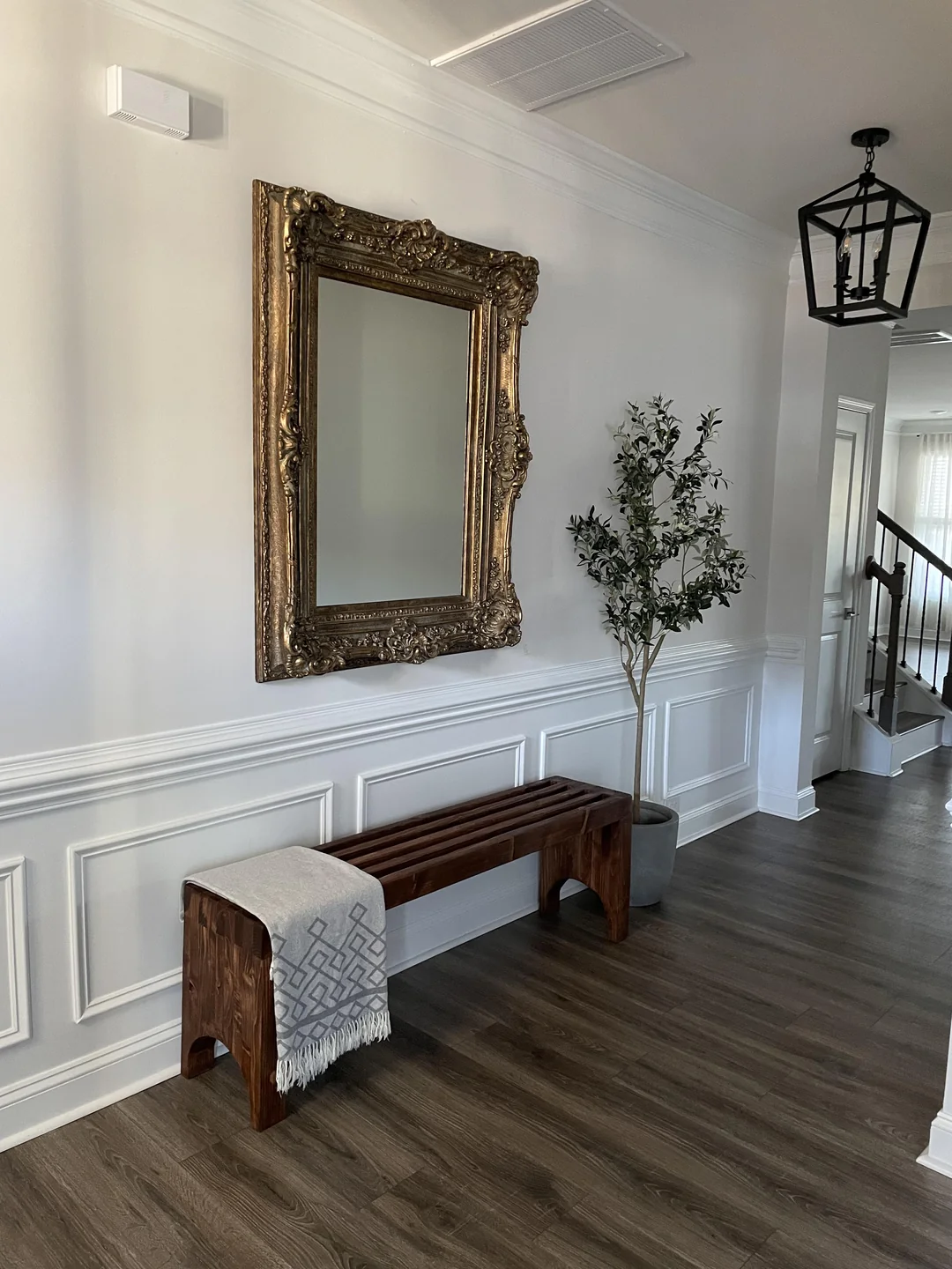 large mirror in small entryway
