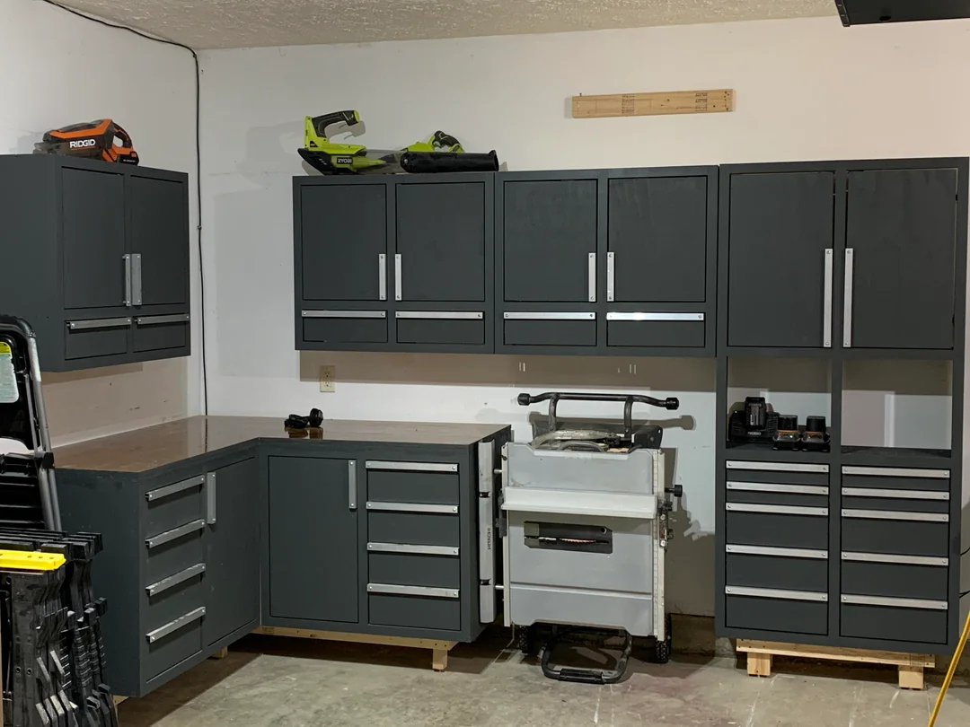 carport with storage cabinets built in
