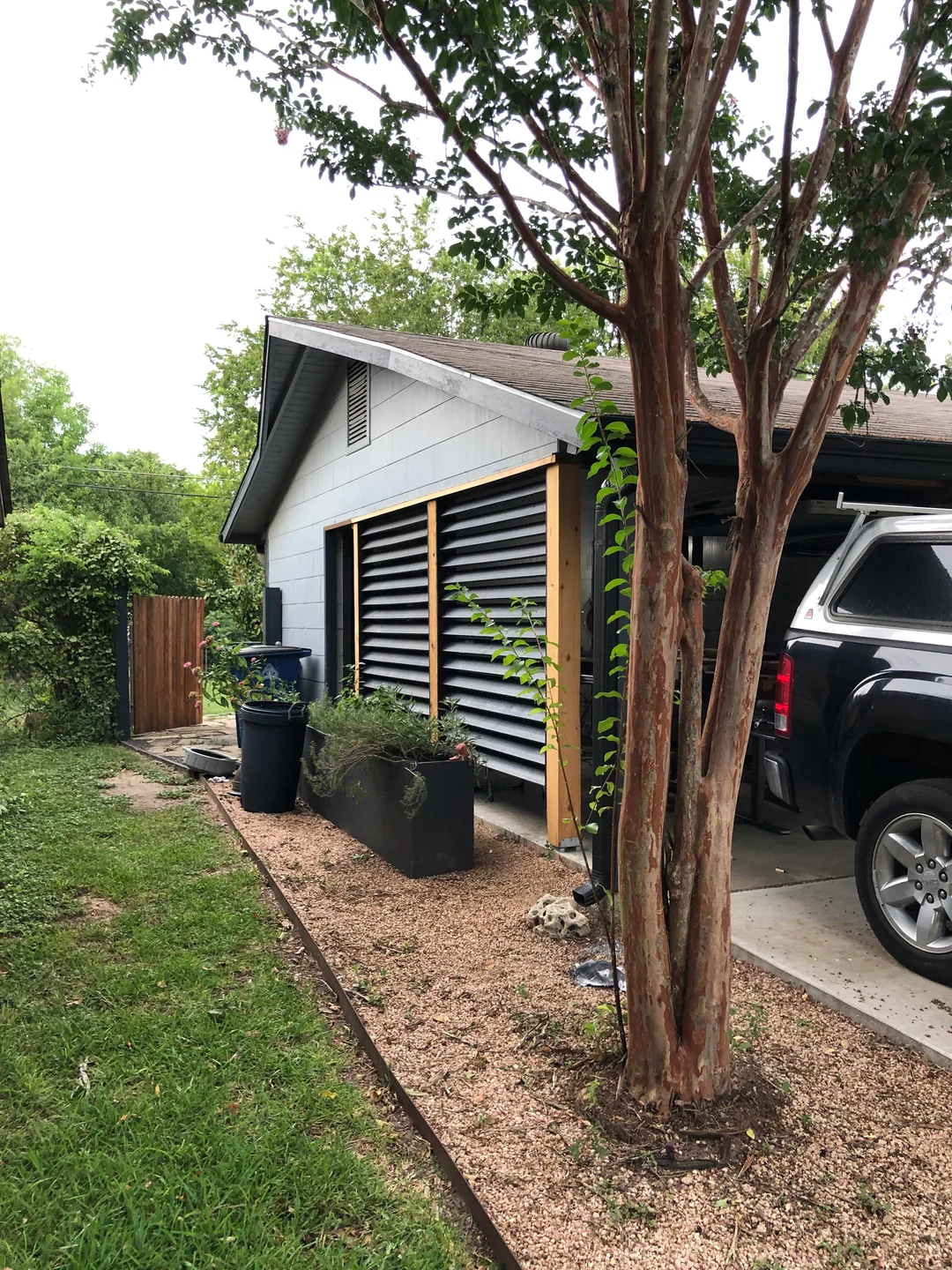 covered carport with screen walls
