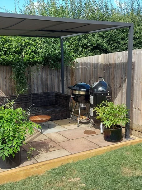 bbq patio with plants and greenery setup

