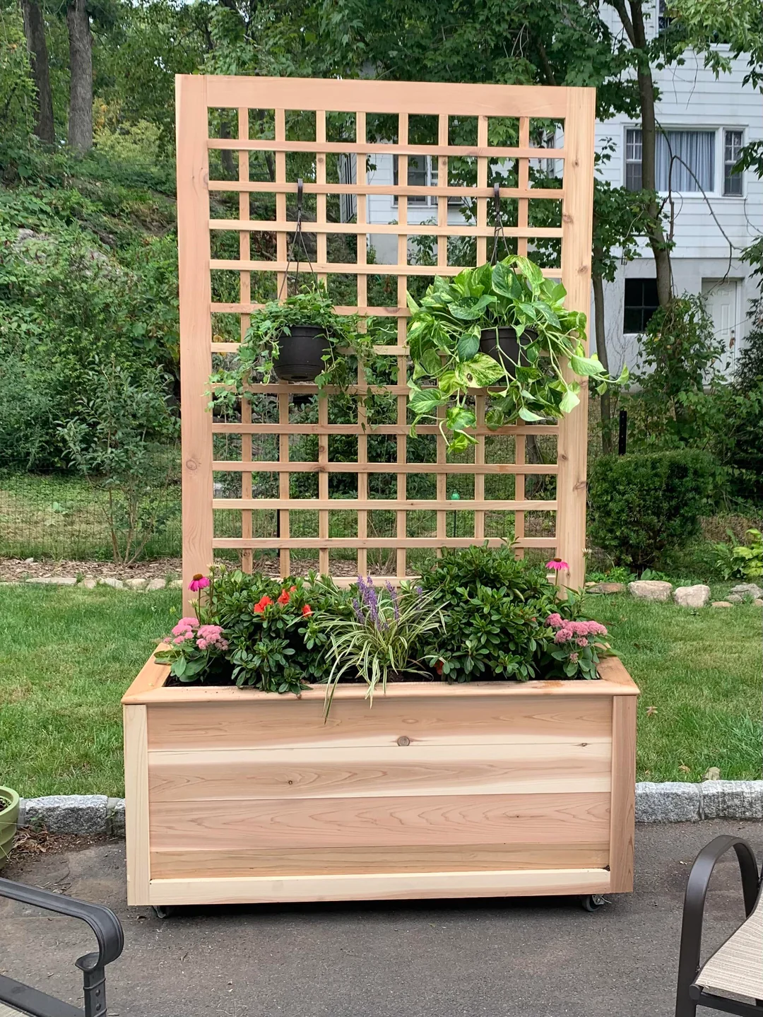 wood fence with planter boxes attached