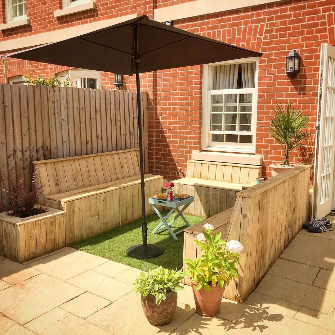 wood fence with built in bench backyard
