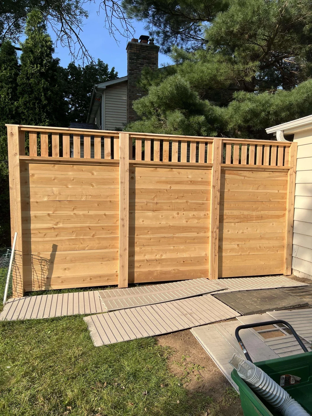 wood fence with lattice top backyard
