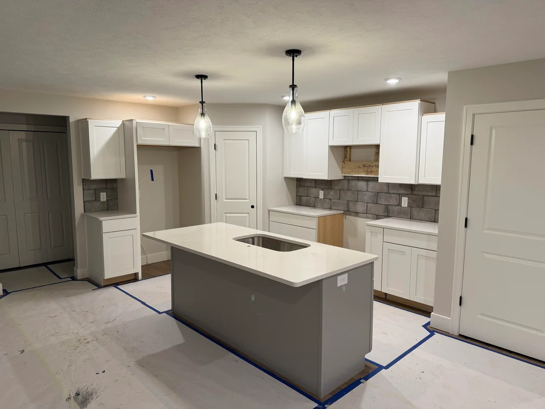open shelving stone backsplash kitchen
