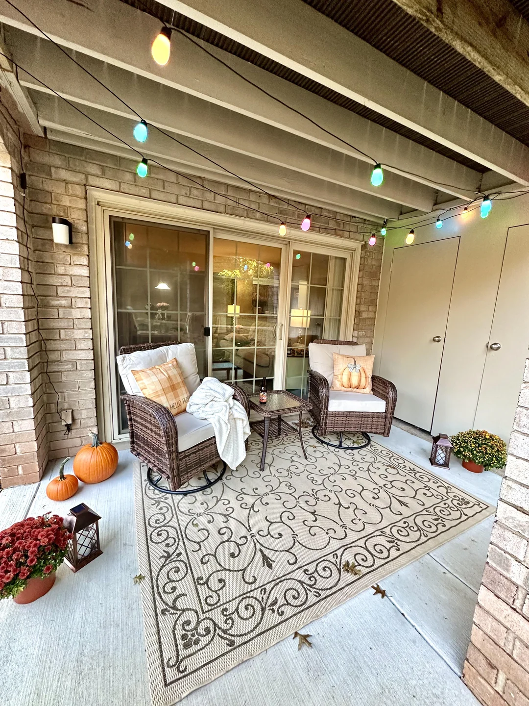 indoor outdoor lighting warm lights patio living room
