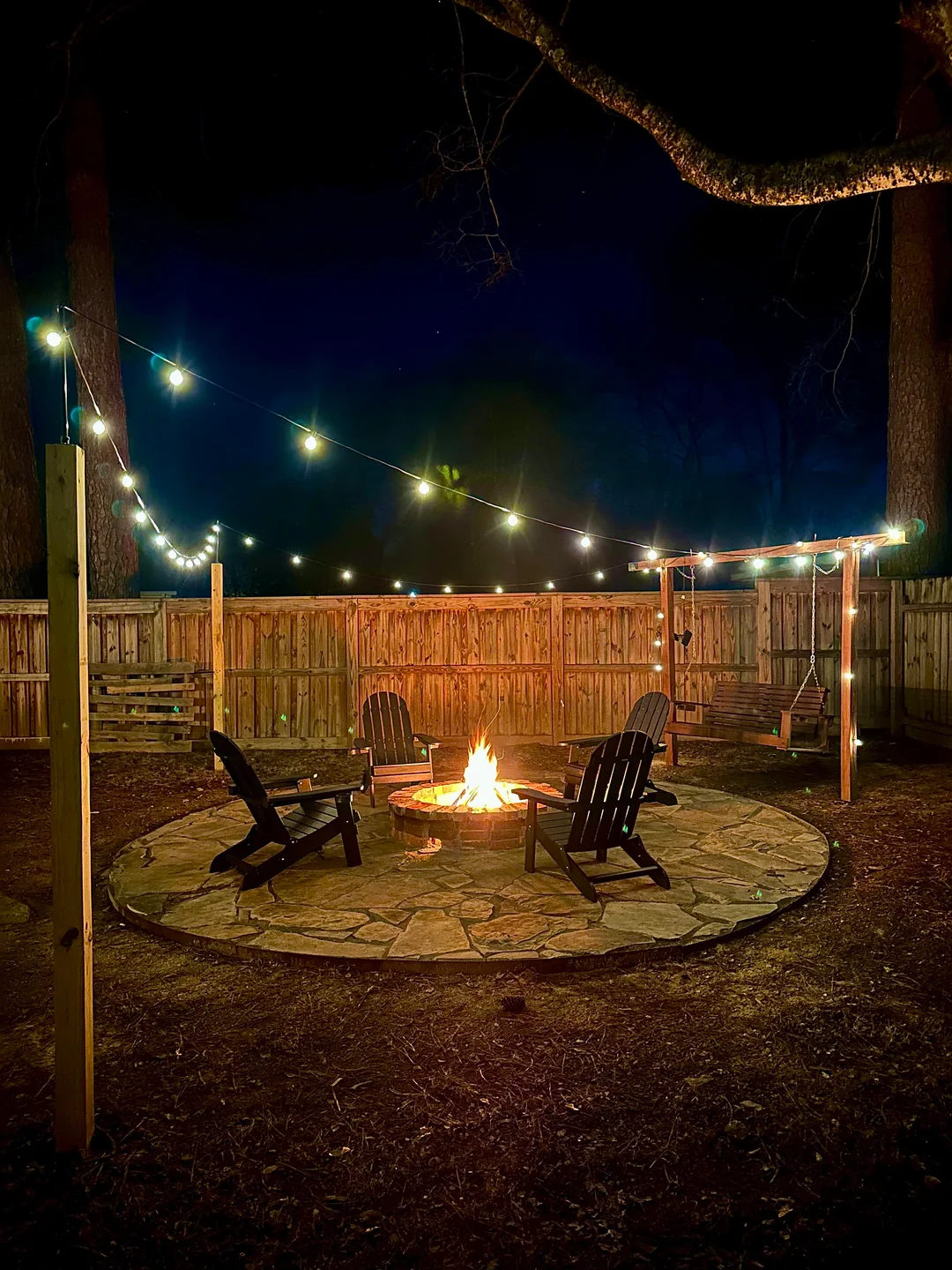 fire pit backyard night seating
