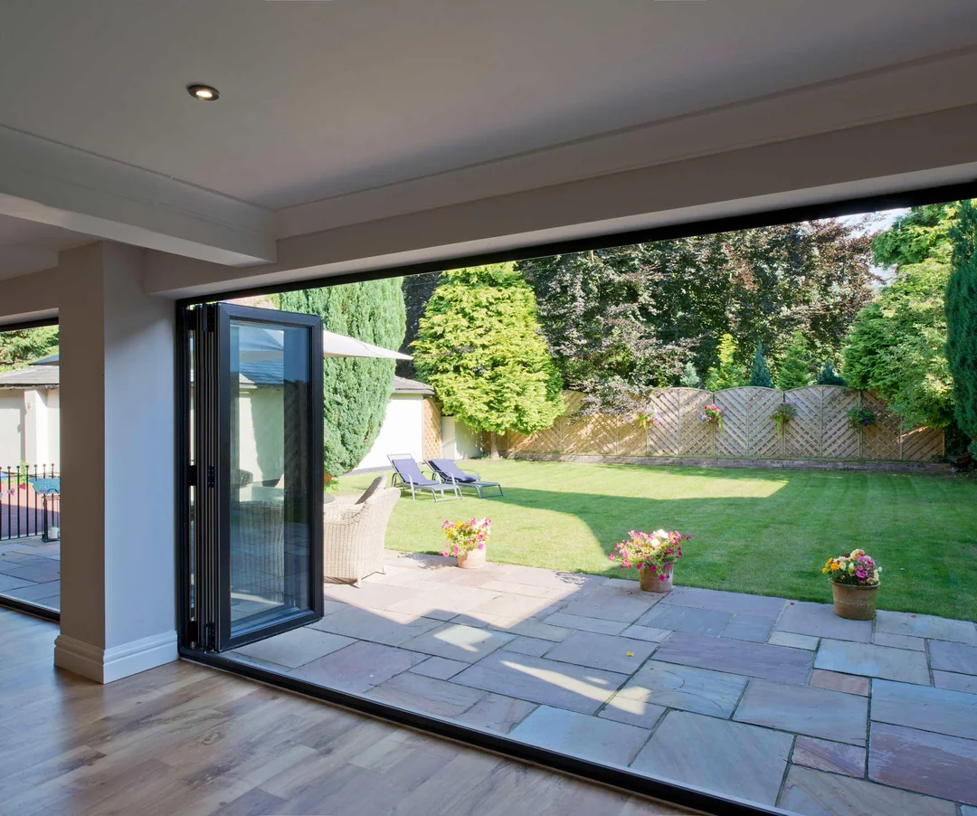 sliding glass wall garden room extension
