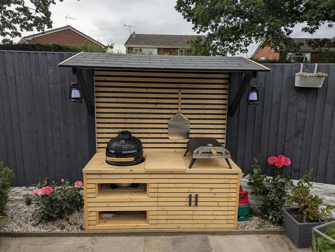 wood roof bbq area backyard design
