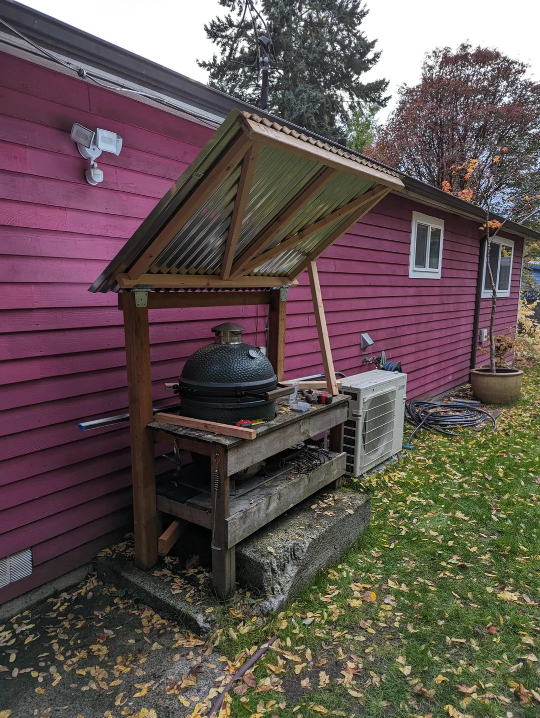small covered bbq corner backyard
