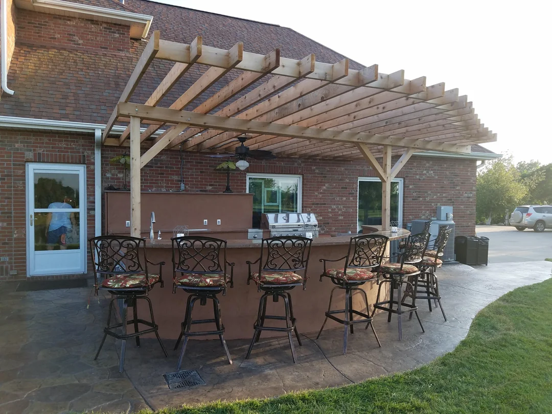 bbq and dining under same roof backyard
