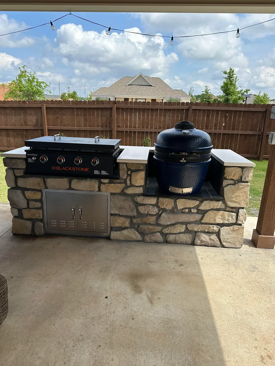 flagstone bbq area real backyard
