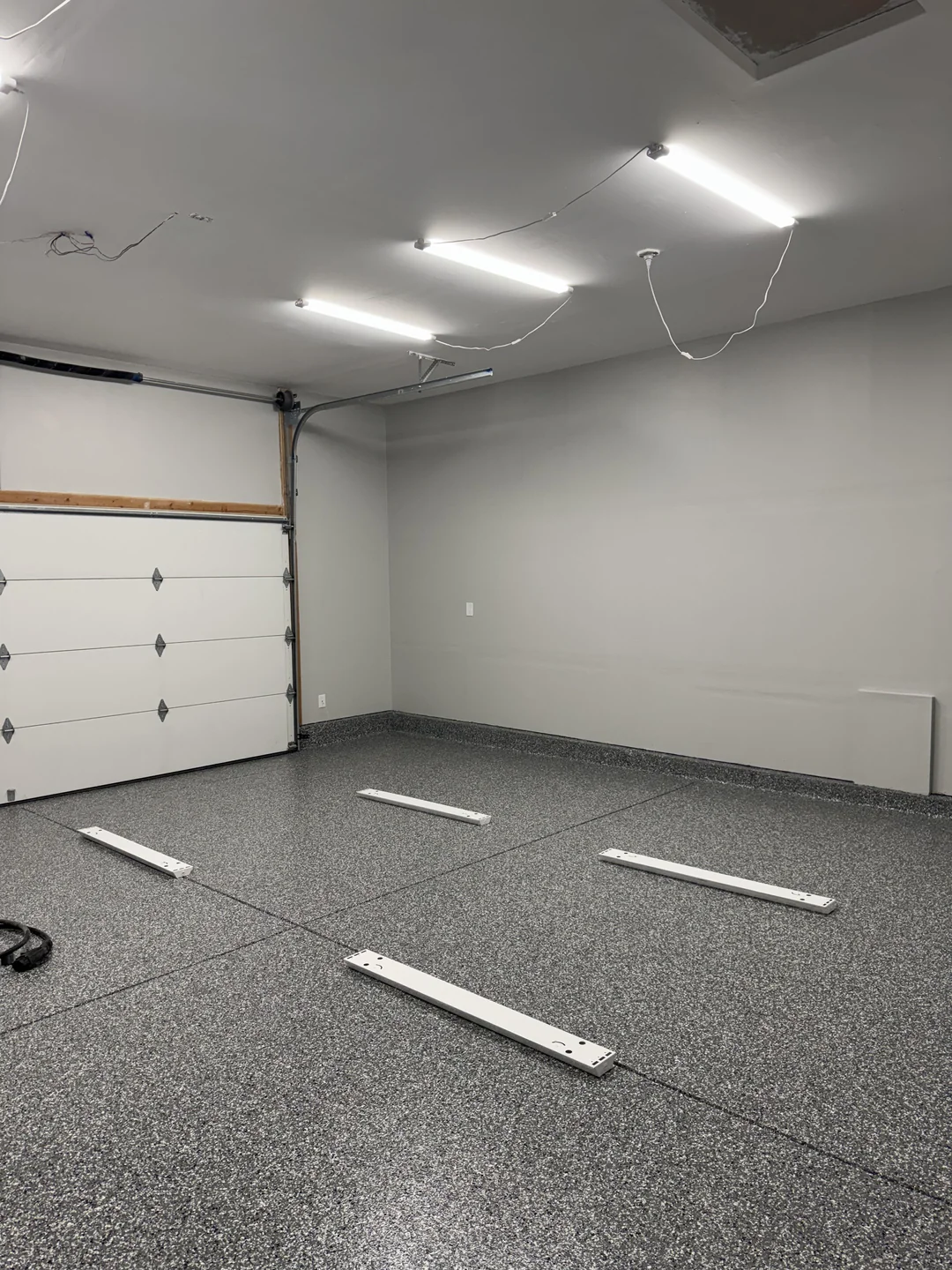 garage workshop lighting setup bright workspace
